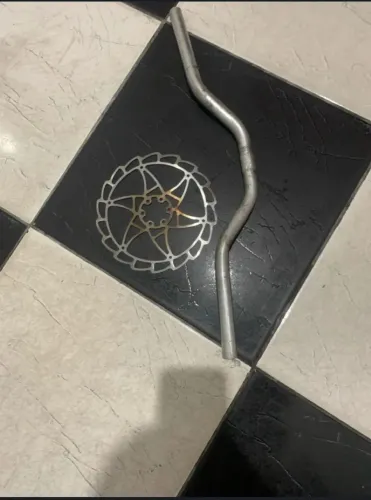 Vendo guidão de moto e um disco de bike