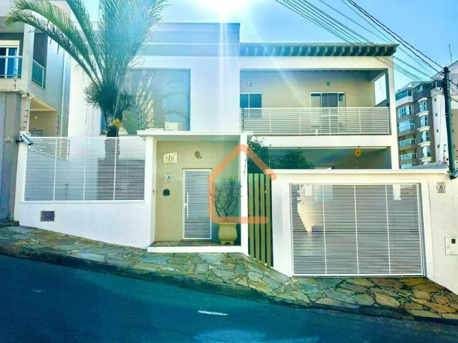 Casa com 3 dormitórios para alugar, 426 m² por R$ 8.000,00/mês - Pousada dos Campos - Pous