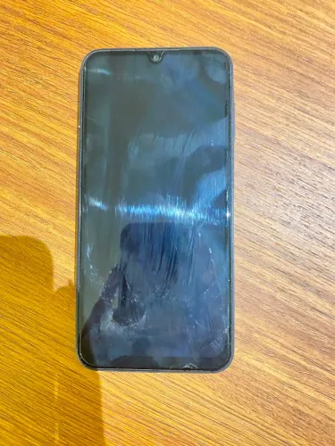 Celular A15 azul escuro, semi novo apenas marcas de uso.
