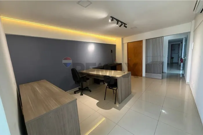 Sala comercial com mobilia