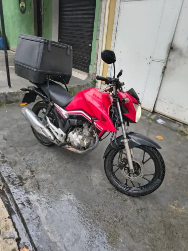 Titan 160 + celular bau