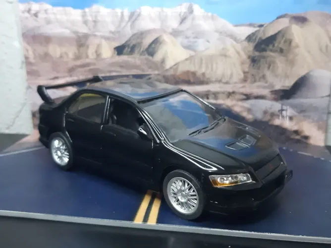 CARRINHO de ferro Mitsubishi Lancer GSR Evolution  LEIA DESCRIÇÃO. 
