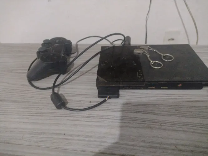 PS2 com 2 opls com um de 54 e um de 31 pra sair rápido !