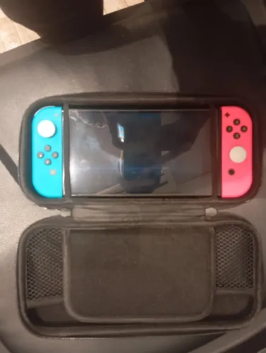 Nintendo switch 256gb cheio de jogo, ele vem com a caixinha tudo certinho.