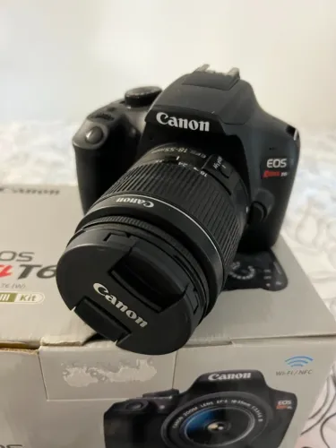 Canon EOS Rebel T6 + Lente 18-55mm + Carregador