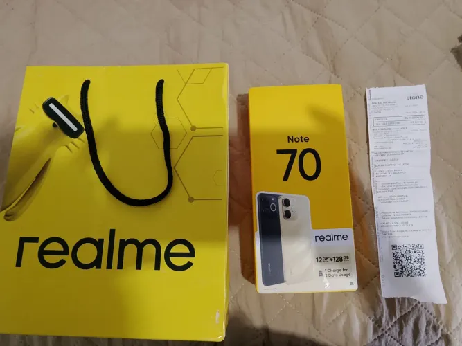 Celular novo Realme Note 70 , com película de privacidade, capa e nota.