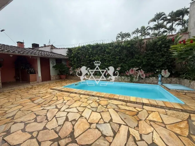 Casa com 2 quartos e piscina à venda, 149 m² - Martim de Sá, Caraguatatuba