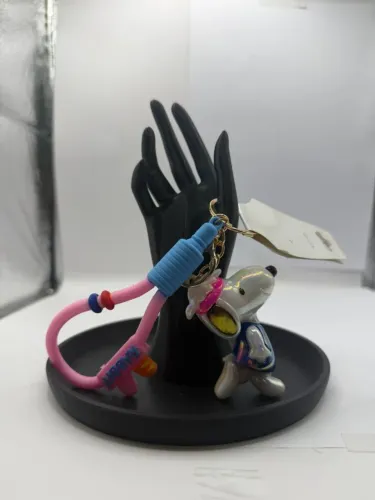 Chaveiro Snoopy astronauta silicone rosa e azul