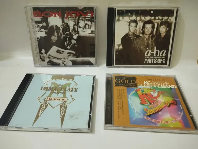 Cd de musica a-ha,bon jovi,kc sunshine,madona