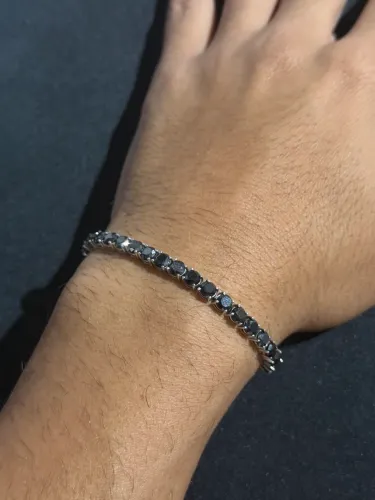Rivieira diamante negro + ouro branco
