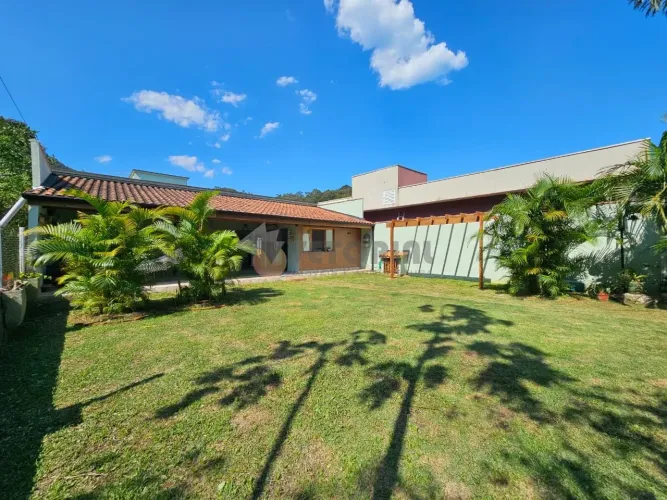 Casa com 3 dormitórios à venda, 215 m² por R$ 690.000 - Massaguaçu - Caraguatatuba/SP