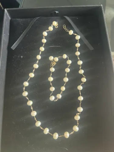 Conjunto colar e pulseira de pérolas e ouro 18k 750