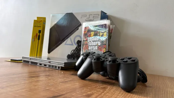 Playstation 2 C/ 2 Controles + Memore Card + Jogos