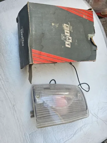 Uno premio Elba fiorino 84 a 90 pisca dianteiro cristal novo original