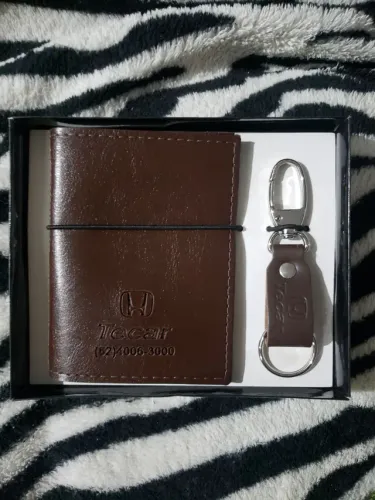 Porta documentos, e chaveiro. Honda