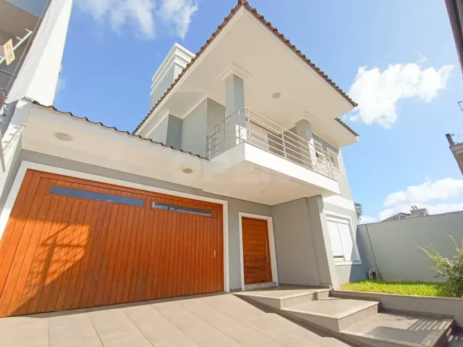 Casa semimobiliada com 230m² para locação no bairro Moinhos de Vento, em Canoas.