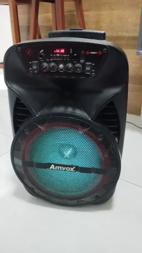 Vendo caixa de som amvox com bateria de moto