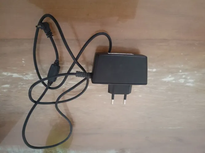 Carregador de tablet positivo
