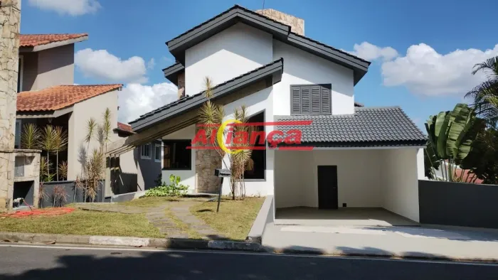Casa condomínio arujá 5 com 3 dormitórios sendo 1 suíte, 3 salas e 6 vagas - Arujá