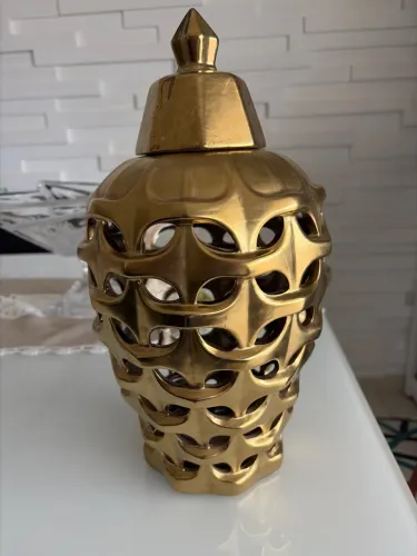 Linda peca dorado de decoracao