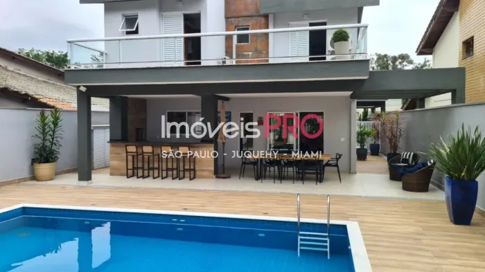 Linda casa em Riviera de São Lourenço com 4 dormitórios e piscina