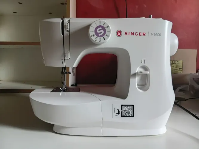 Maquina de costura portatil Singer