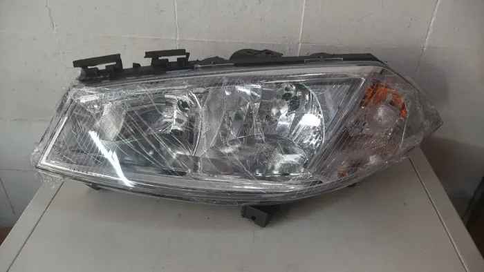 Farol megane esquerdo 