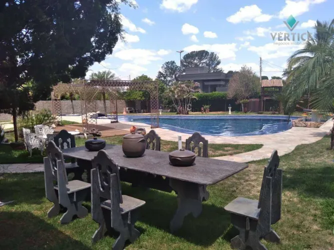 Chácara com 4 dormitórios à venda, 1400 m² por R$ 2.500.000 - Monte Carlo - Guapiaçu/SP