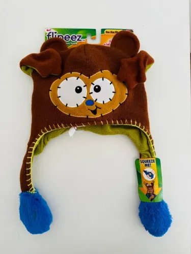 Touca divertida comprado nos EUA. Vc aperta e ela abre os braços ?