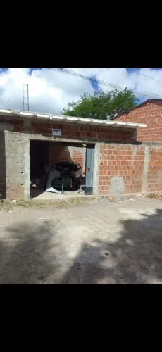 Vendo ou troco  este terreno  com  metade  na laje, e escada 