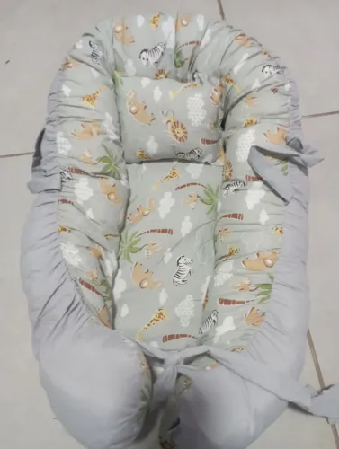 Ninho redutor de berço masculino