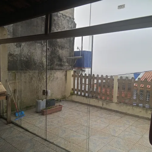Porta de vidro loja sacada fechamento de área  