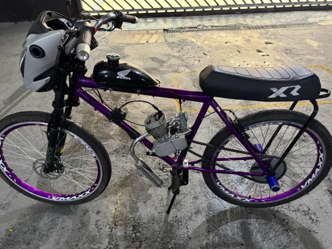 Vendo bike motorizada em ótimo estado e funcionando olhar descrição