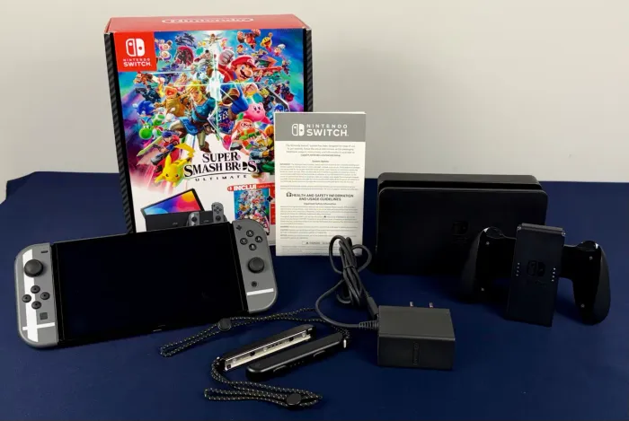 Nintendo Switch OLED SUPER SMASH BROSS - ACEITAMOS TROCAS/PARCELAMENTO EM ATÉ 18x
