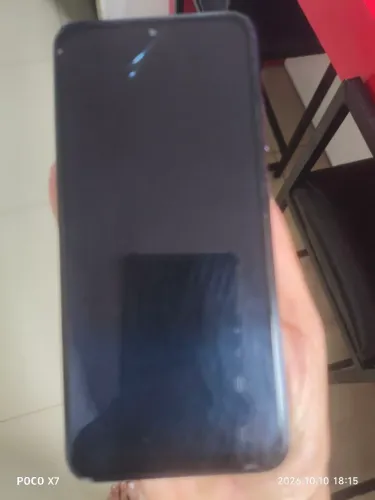 CelularXiaomi Redmi Note 10S (modelo M2101K7BG), na cor cinza/azul escuro