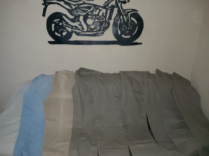 Lote de 9 calças masculinas número 54 R$25.00 cada ou todas por R$180.00 sou de itapetinin