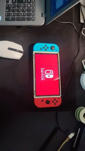 Nintendo Switch OLED Completo + Controle Extra PowerA + Kit de Capas