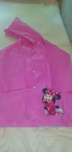 Capa de chuva Minnie provavelmente 8/10 anos .