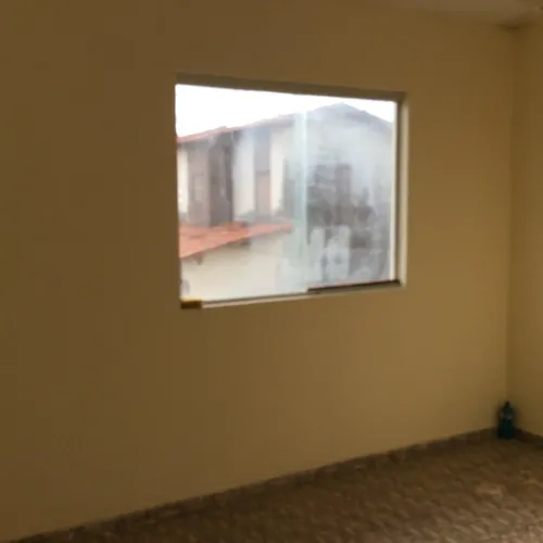 Prédio com KitNets  e ponto comercial
