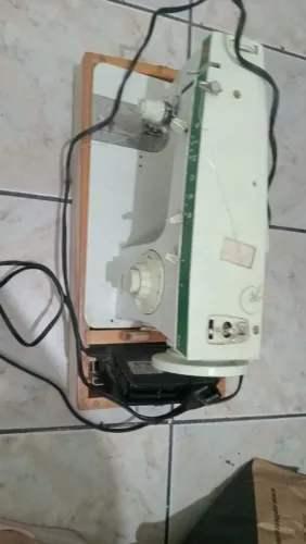 Máquina de costura singer