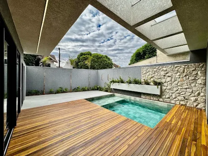 Casa de esquina com 3 suítes e piscina à venda, 197 m² por R$ 2.100.000 - Jardim Iguaçu -