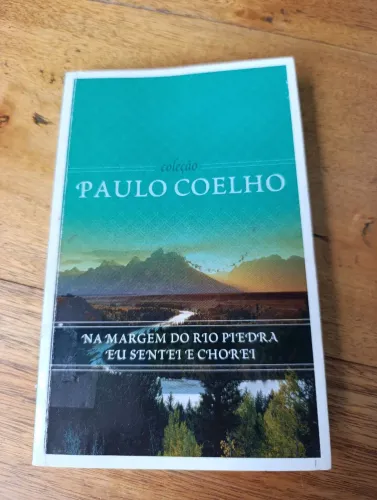 LIVRO NA MARGEM DO RIO PIEDRA EU SENTEI E CHOREI. COLEÇÃO PAULO COELHO 