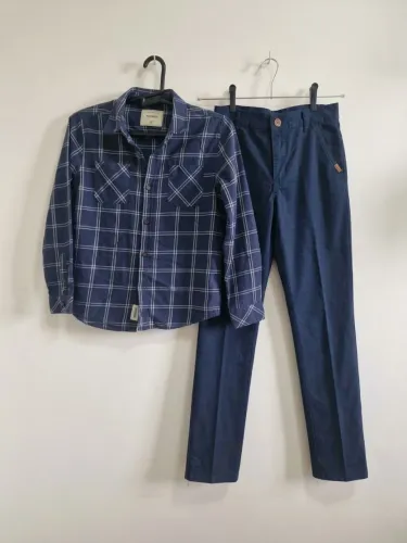  Camisa Xadrez  10 e Calça Sarja  12