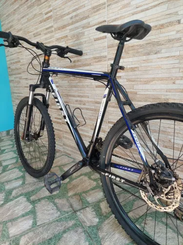 Bicicleta First aro 26 bike 24v shimano acera