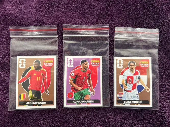 Figurinhas Legends Copa do Mundo 2026 - Doku, Modric e Hakimi