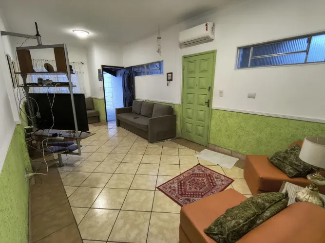 Casa com 2 dormitórios à venda, 130 m² por R$ 550.000,00 - Vila Guilhermina - Praia Grande