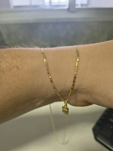 Vendo corrente de ouro com pingente