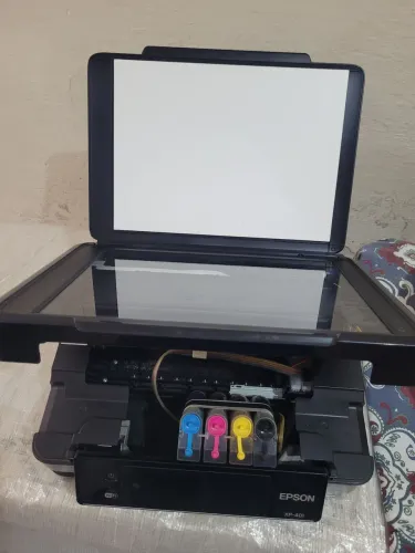 Impressora Epson XP401 c/ bulk ink. Obs: liga mas não funciona