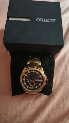 relógio Orient dourado, modelo MGSSC041 P1KX
