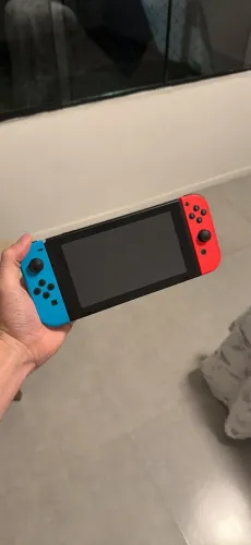 Nintendo Switch 32Gb + Controle Joy-Con Neon